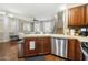 Kitchen features stainless steel appliances and wood cabinetry at 3039 W Sand Flower Dr, Phoenix, AZ 85086