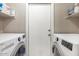 Laundry room with LG washer and dryer, and shelving at 3039 W Sand Flower Dr, Phoenix, AZ 85086