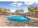 Freeform community pool with a large patio area at 3039 W Sand Flower Dr, Phoenix, AZ 85086