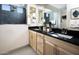 Modern bathroom with a double vanity and large mirror at 32359 N 19Th Ln, Phoenix, AZ 85085