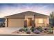 Single-story home with a two-car garage and desert landscaping at 32359 N 19Th Ln, Phoenix, AZ 85085