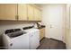 Bright laundry room with Whirlpool washer and dryer at 32359 N 19Th Ln, Phoenix, AZ 85085