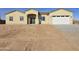 New single-story home with a two-car garage and desert landscaping at 33406 W Campbell Ave, Tonopah, AZ 85354