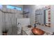 Modern bathroom with granite vanity and a walk-in shower at 3604 N 162Nd Ave, Goodyear, AZ 85395