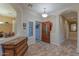 Spacious foyer with tile flooring and a view to the living room at 3604 N 162Nd Ave, Goodyear, AZ 85395