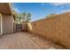 Small backyard with brick paving and a block wall at 4044 E Oakland St, Gilbert, AZ 85295