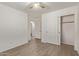 Bedroom with sliding door closet and bathroom access at 4044 E Oakland St, Gilbert, AZ 85295