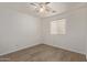 Bright bedroom with ceiling fan and window blinds at 4044 E Oakland St, Gilbert, AZ 85295