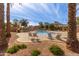 Refreshing community pool with lounge chairs and palm trees at 4044 E Oakland St, Gilbert, AZ 85295