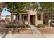 Two-story house with covered porch and mature trees at 4044 E Oakland St, Gilbert, AZ 85295