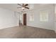 Spacious living room with hardwood floors and ceiling fan at 4044 E Oakland St, Gilbert, AZ 85295