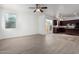 Open layout of the living room and kitchen featuring sliding glass doors at 4044 E Oakland St, Gilbert, AZ 85295