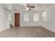 Bright living room featuring hardwood floors and a ceiling fan at 4044 E Oakland St, Gilbert, AZ 85295