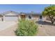 Ranch style home with solar panels and landscaped yard at 4202 W Wood Dr, Phoenix, AZ 85029