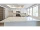 Modern kitchen with white cabinets and quartz countertops at 4202 W Wood Dr, Phoenix, AZ 85029