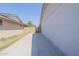 Side yard with concrete pathway and block wall at 4202 W Wood Dr, Phoenix, AZ 85029