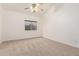 Bright bedroom with carpet flooring and ceiling fan at 4322 E South Fork Dr, Phoenix, AZ 85044