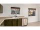 Kitchen boasts double sink, dishwasher, and neutral countertops at 4322 E South Fork Dr, Phoenix, AZ 85044