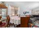 Casual dining area with round table and floral tablecloth at 45579 W Rainbow Dr, Maricopa, AZ 85139