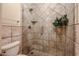 Bathroom with a large tiled shower and glass door at 5432 W Fallen Leaf Ln, Glendale, AZ 85310