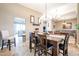 Bright dining area with large table and chairs at 5432 W Fallen Leaf Ln, Glendale, AZ 85310