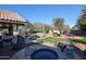 Private backyard spa with ample seating and a view of the mountains at 5432 W Fallen Leaf Ln, Glendale, AZ 85310