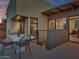 Private balcony with small table and chairs overlooks mountain views at 6525 E Cave Creek Rd # 14, Cave Creek, AZ 85331