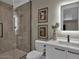 Modern bathroom with glass shower, floating vanity, and updated fixtures at 6525 E Cave Creek Rd # 14, Cave Creek, AZ 85331