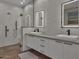 Modern bathroom with double sinks, walk-in shower, and sleek design at 6525 E Cave Creek Rd # 14, Cave Creek, AZ 85331