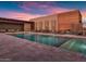 Resort-style community pool with lounge chairs at 6525 E Cave Creek Rd # 14, Cave Creek, AZ 85331