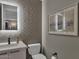 Modern powder room with gray chevron tile and floating vanity at 6525 E Cave Creek Rd # 14, Cave Creek, AZ 85331