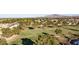 Aerial view of a golf course and neighborhood at 6562 S Sawgrass Dr, Chandler, AZ 85249