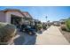 Home exterior with golf cart and walkway at 6562 S Sawgrass Dr, Chandler, AZ 85249