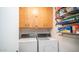 Convenient laundry room with washer and dryer at 6562 S Sawgrass Dr, Chandler, AZ 85249