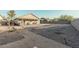 Landscaped backyard with gravel and pathways at 6910 S 26Th Ln, Phoenix, AZ 85041