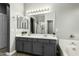 Bathroom with double vanity and soaking tub at 6910 S 26Th Ln, Phoenix, AZ 85041