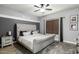 Spacious bedroom with plush carpet and ceiling fan at 6910 S 26Th Ln, Phoenix, AZ 85041