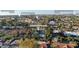 Aerial view of the house, pool, and surrounding neighborhood at 7489 E Windrose Dr, Scottsdale, AZ 85260