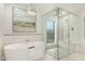 Luxury bathroom with a freestanding tub and a large walk in shower at 7489 E Windrose Dr, Scottsdale, AZ 85260