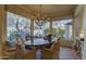 Charming breakfast nook with built-in seating and window views at 7546 E High Point Dr, Scottsdale, AZ 85266