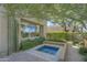 Private hot tub nestled in a secluded desert garden at 7546 E High Point Dr, Scottsdale, AZ 85266