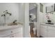 Chic guest bathroom with white cabinets and patterned tile at 8443 E Bonita Dr, Scottsdale, AZ 85250