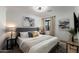 Serene bedroom featuring a gray headboard and gold accents at 8443 E Bonita Dr, Scottsdale, AZ 85250