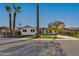 Beautiful mid-century modern home with lush green lawn at 8443 E Bonita Dr, Scottsdale, AZ 85250