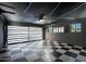 Stylish garage with modern lighting and epoxy floor at 8443 E Bonita Dr, Scottsdale, AZ 85250