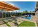 Modern pool with spa and brick patio at 8443 E Bonita Dr, Scottsdale, AZ 85250