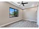 Bedroom with large window and mountain views at 8474 W Switchback Trl, Casa Grande, AZ 85194