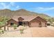 Stunning desert home with a three-car garage and mountain views at 8474 W Switchback Trl, Casa Grande, AZ 85194