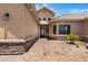 Elegant entryway with decorative iron door and stone accents at 8474 W Switchback Trl, Casa Grande, AZ 85194