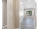 Bright hallway with wood-look tile flooring at 8474 W Switchback Trl, Casa Grande, AZ 85194